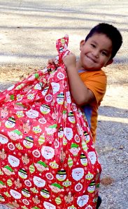 Child Carrying Present